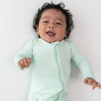 KYTE BABY ZIPPERED FOOTIE IN MINT