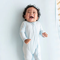 KYTE BABY ZIPPERED ROMPER IN POWDER