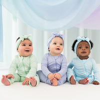 KYTE BABY ZIPPERED ROMPER IN POWDER