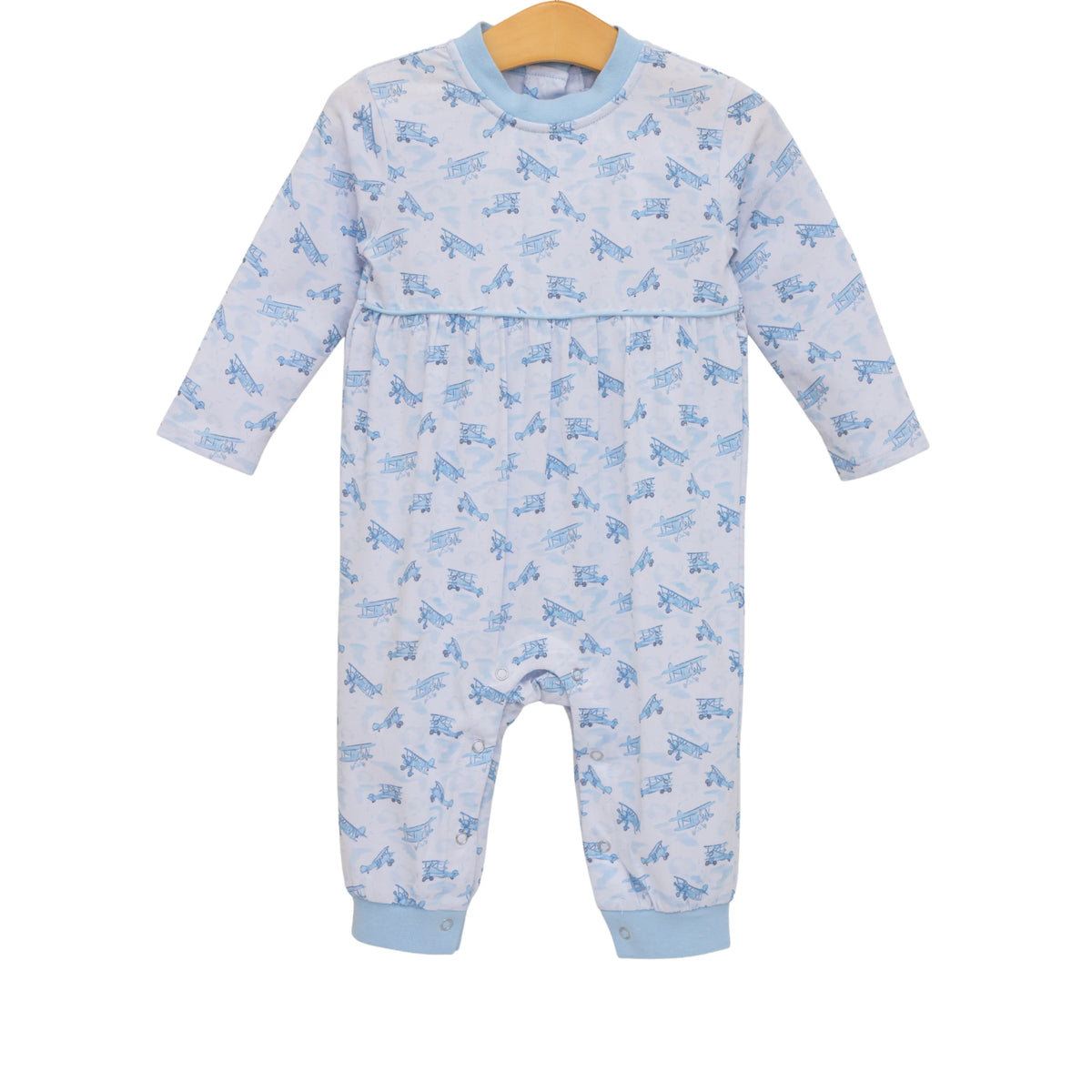 Baby onesie with blue animal pattern on a white background