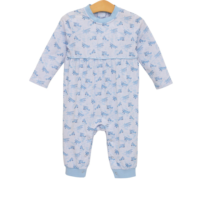 Baby onesie with blue animal pattern on a white background