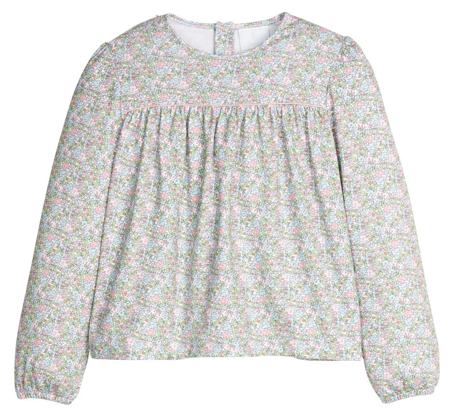 Floral blouse with long sleeves on a white background