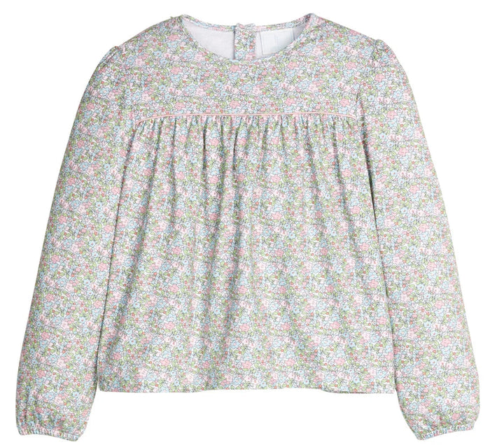 Floral blouse with long sleeves on a white background