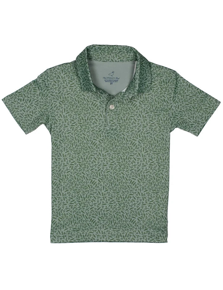 Green patterned polo shirt on a white background