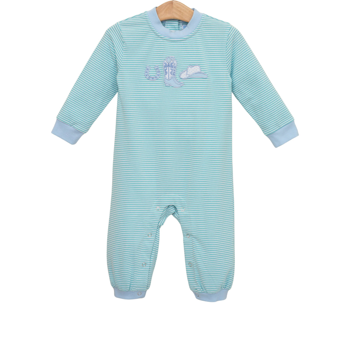 A baby long-sleeve footless one-piece sleeper with light blue and white horizontal stripes, featuring a small embroidered whale design on the chest and light blue ribbed cuffs and hem, shown on a wooden hanger against a white background.