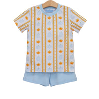 A children's two-piece pajama set featuring a short-sleeve top and matching shorts. The top is white with vertical stripes of orange pumpkins, light blue lanterns, and gold dotted borders, with a light blue collar.