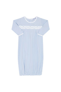 Light blue baby dress with long sleeves on a white background