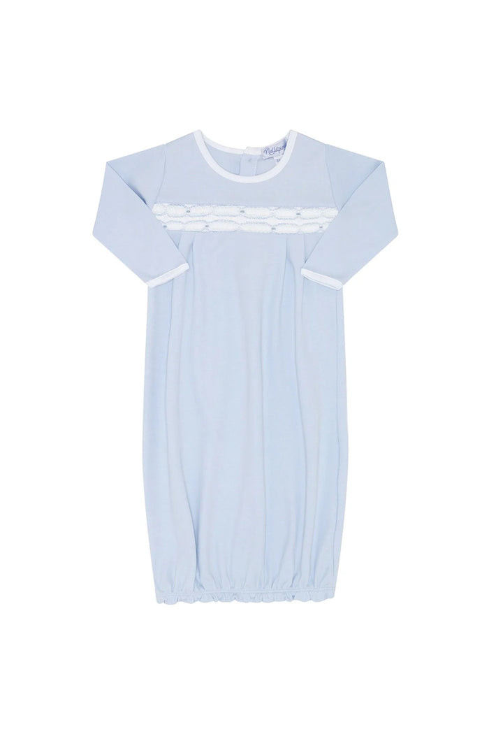 Light blue baby dress with long sleeves on a white background