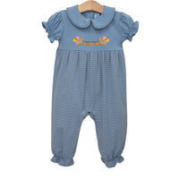 A baby's short-sleeve jumpsuit in dusty blue with fine horizontal stripes, featuring a Peter Pan collar and an embroidered floral design on the chest, hanging on a wooden hanger against a white background.