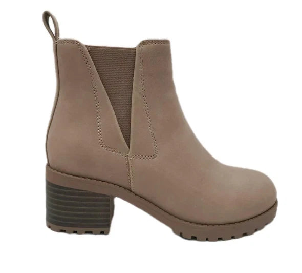 A taupe brown suede Chelsea-style ankle boot with a chunky block heel and elastic side gore, shown from a side profile on a white background.